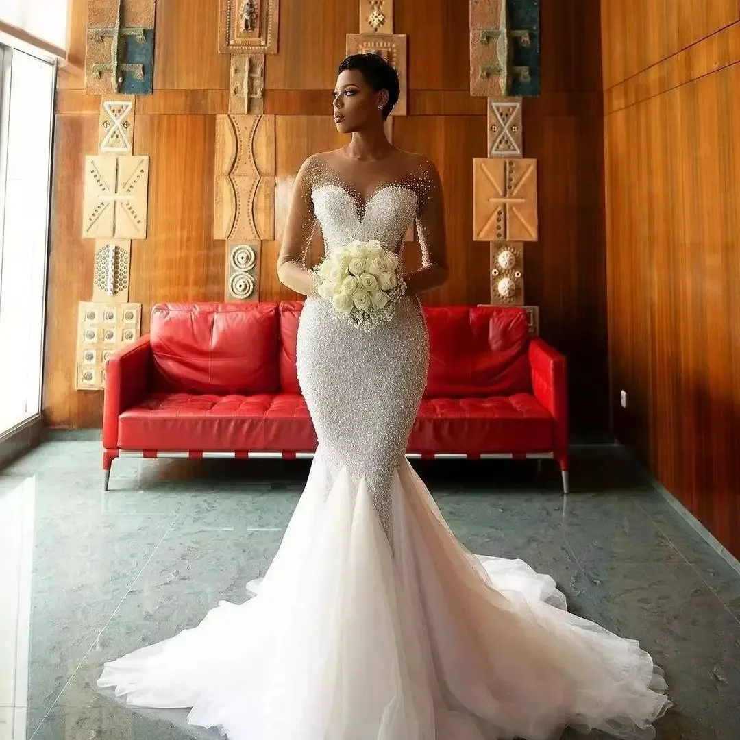 2026 Vestido de novia sexy de sirena, vestido de novia de tul con perlas y cuello redondo de ilusión y mangas largas para boda en la iglesia