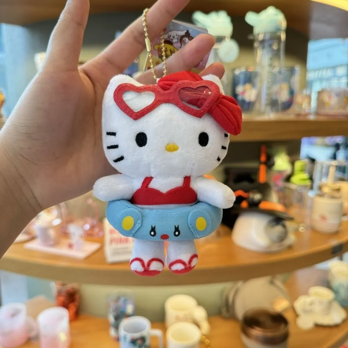 Hello Kitty Plushies Miniso genuino 13cm felpa Kawaii círculo de natación Bikini llavero colgante gato mochila decoración muñeca regalo