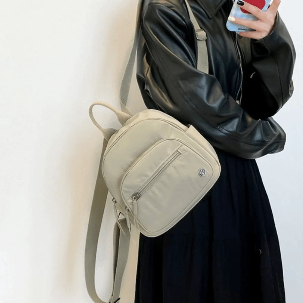 

Портативный женский нейлоновый рюкзак однотонный водонепроницаемый с множеством карманов повседневный модный рюкзак с ручкой