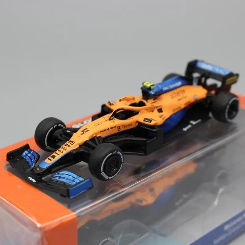 F1 Formula 1 model 1:64 Riccardo Norris MCL35M Italian Grand Prix decorated car model presents a child\'s Christmas present.