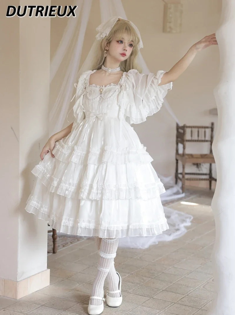 

Оригинальный дизайн в японском стиле Лолита JSK элегантное Пышное Короткое Платье милое однотонное платье средней длины на бретельках для девочек