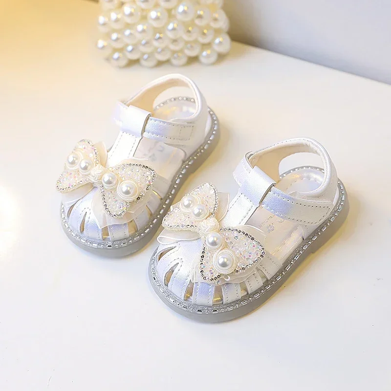

Girls Walking Shoes Cute Pearls Hollowed-out Toddler Princess Shoes Non-slip 2025 Summer New Baby Sandals Soft Sole Sweet Bows