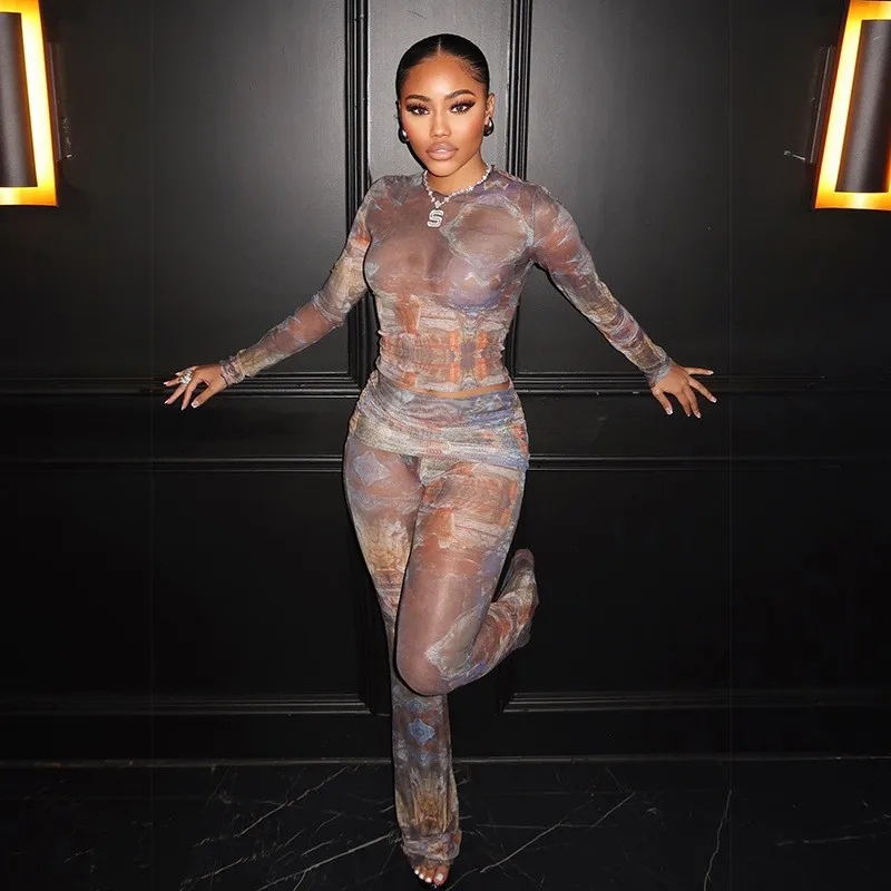 

Осенне-зимний женский комплект одежды: прозрачный топ с длинным рукавом и облегающие брюки из полиэстера с абстрактным сетчатым узором, облегающий силуэт, две части