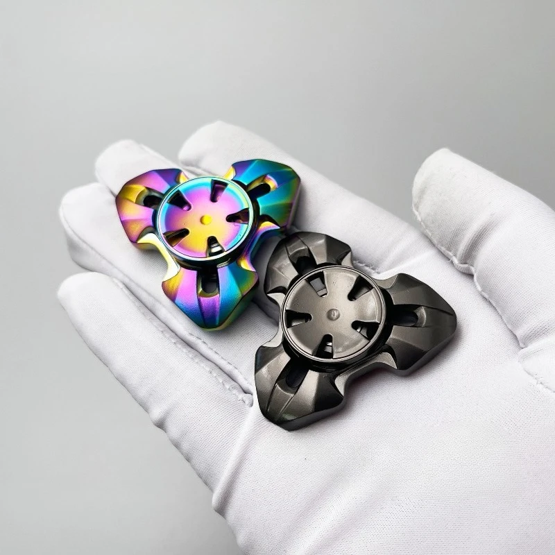 Brinquedo de descompressão de giroscópio de ponta do dedo giratório oco de três páginas de metal mecânico EDC desdentado