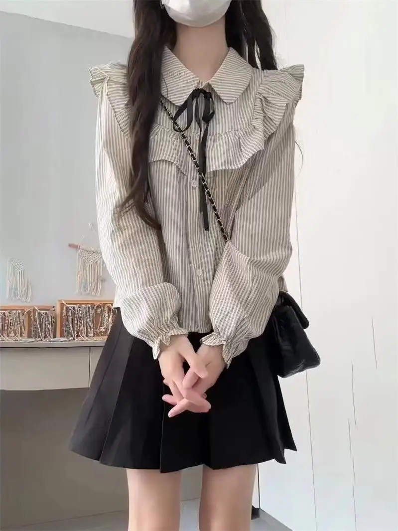 

Японский колледж Sle Маленький Cheered irt Женский студенческий слой с высокой талией Ультра сказочная юбка Комплект из двух предметов Длинная свеч Поли...