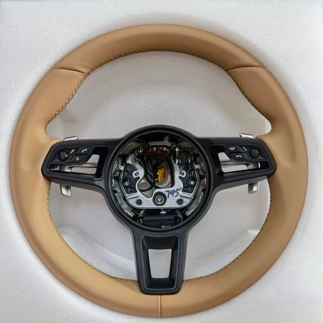

Steering Wheel - made of beige leather and ergonomically designed for high-performance driving and daily city commuting