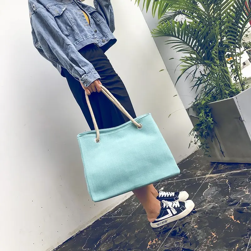 

The Straw & Canvas It Bag of 2022. Your new go-to spacious crossbody for a relaxed, effortless style.