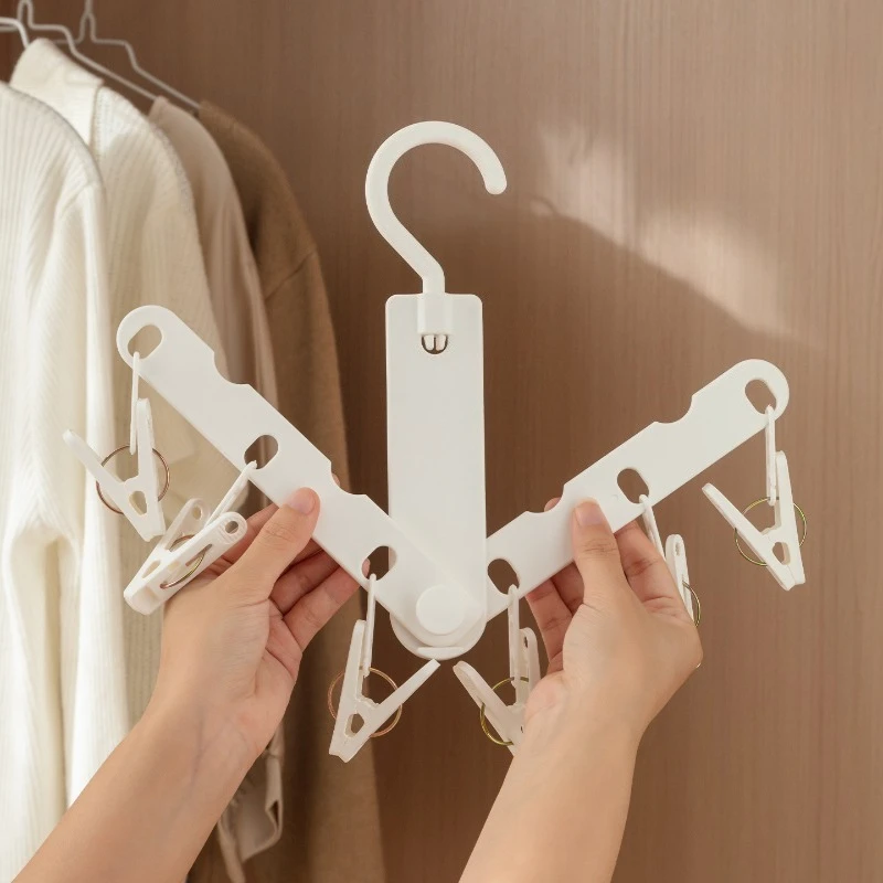 Multi-functional Foldable Travel Hanger, A Must-have for Portable Outdoor and Business Trips (includes Six Clips)