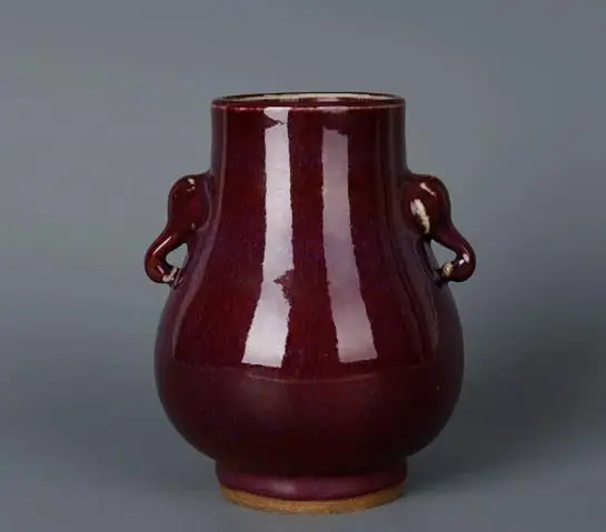 

Antique red-glazed porcelain vase with elephant ears, a collectible and home decoration item in Qing Dynasty