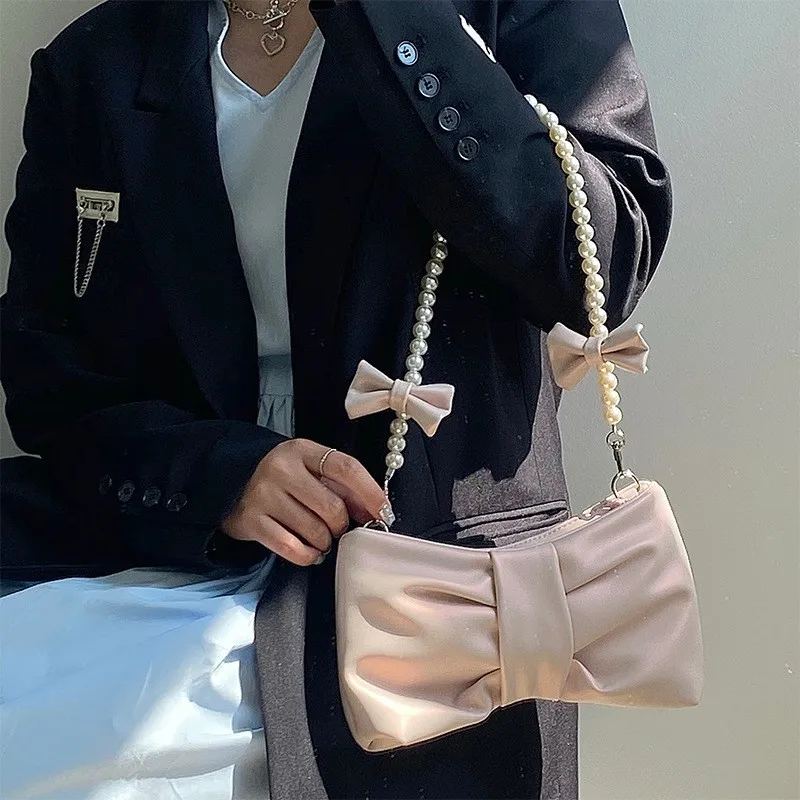 

Teenage girl pearl bow underarm bag 2025 new small fresh fairy bag Korean version of the single-shoulder handheld crossbody bags