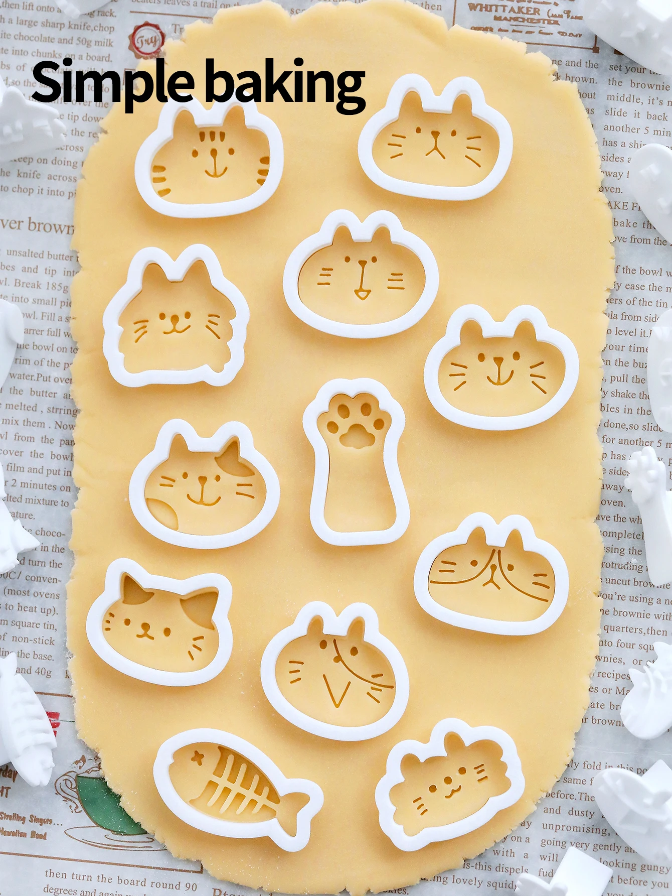 A Cute Little Cat Patterned Cookie Mold, a Cookie Stamp with Cat, Cat Paws and Little Fish Cartoon Patterns, a Cookie Cutter