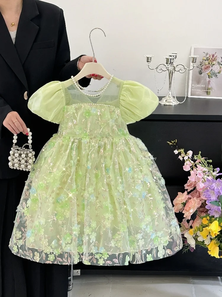 Letnia sukienka dla dziewczynek z motywem kwiatowym, bufiaste rękawki, spódniczka, moda dziecięca, wiązana.