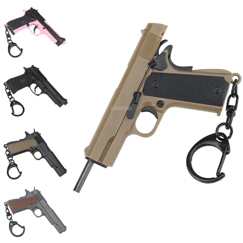 Mini Pistol Shape Keychain 1911 / M92 Model Plastic Key Ring Detachable Tactical Gun Model Keychain Backpack Decorations Gifts