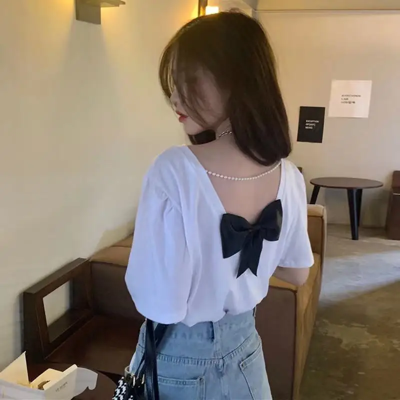 Camiseta corta de diseño y complicado con espalda descubierta para mujer, Top coreano holgado con mangas abullonadas, verano 2025