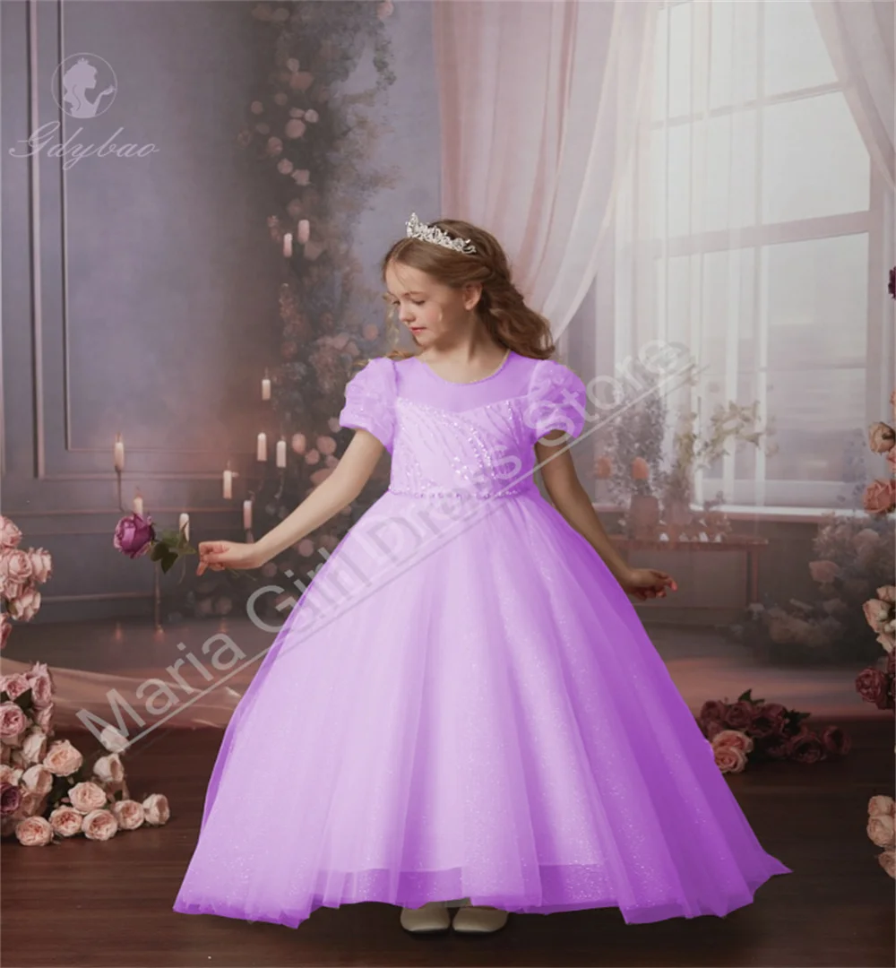 Eleganckie sukienki dla dziewczynek sypiących kwiatki, długie, prześwitujące, z okrągłym dekoltem, idealne na konkursy piękności, sakramenty, wesela i przyjęcia.