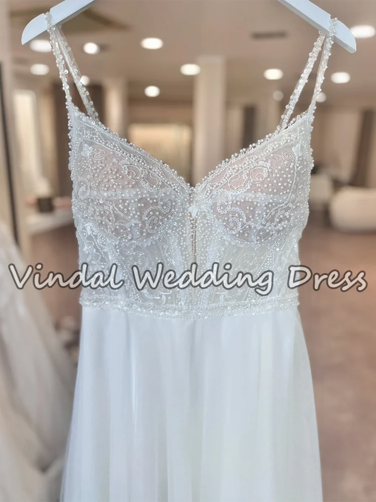 ชุดแต่งงานสายเดี่ยวประดับมุกหรูหราทรงเอไลน์ผ้าทูลล์ รุ่น Vindal Luxury Pearl Beading ปี 2026 สไตล์โบฮีเมียน สำหรับงานแต่งงานแบบเรียบง่าย สามารถสั่งตัดได้