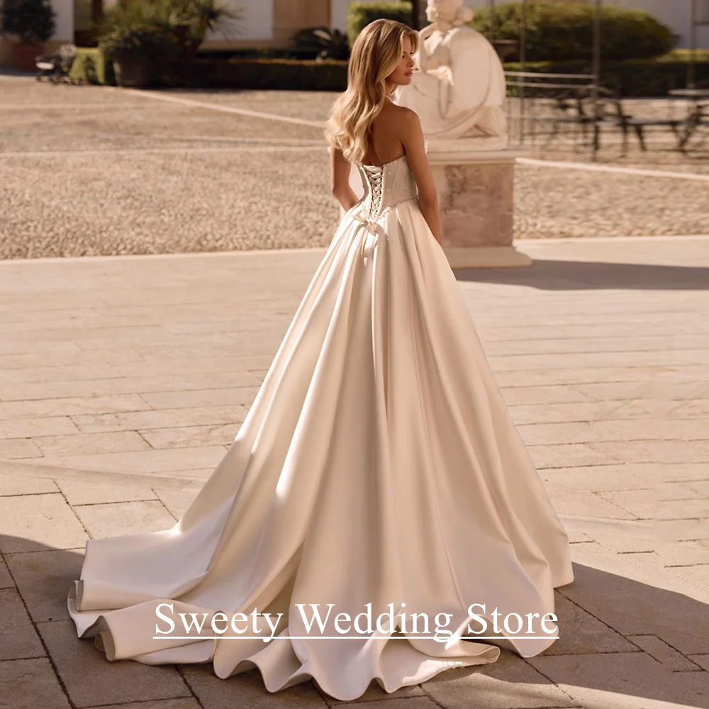 فستان زفاف مشد مخصص على شكل قلب بدون أكمام لؤلؤ سويب تراين بدون ظهر فيستدو نويفا المملكة العربية السعودية فستان زفاف