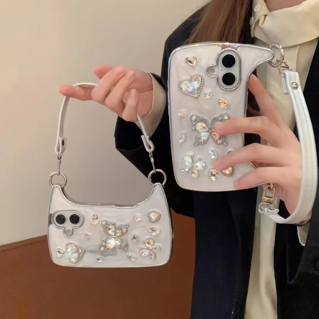 Custodia per telefono da polso con cinturino in pelle per borsa a forma di cuore con diamanti glitterati di lusso per iPhone 11 12 13 14 15 16 Pro Plus Max