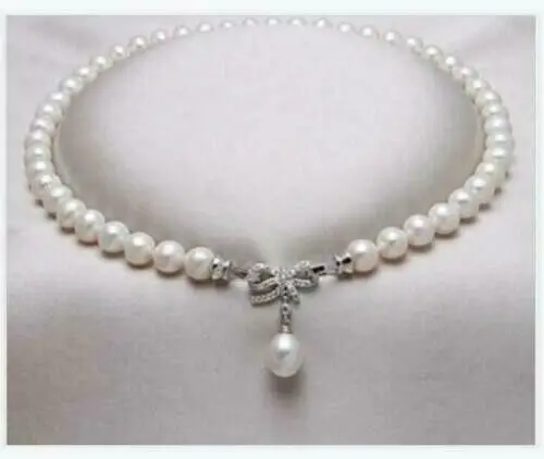 

AAAA Round 9-10mm Natural South China Sea True White Pearl Necklace 18 inches+Pearl Pendant