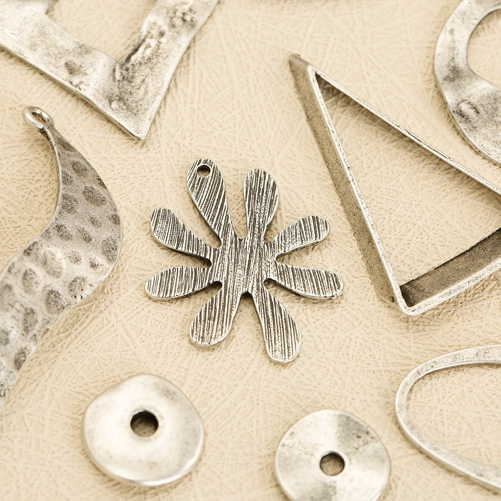 إكسسوارات المجوهرات التي تصنعها بنفسك: قلائد هندسية بيضاوية الشكل وأساور وأقراط وإكسسوارات مجوهرات مصنوعة يدويًا