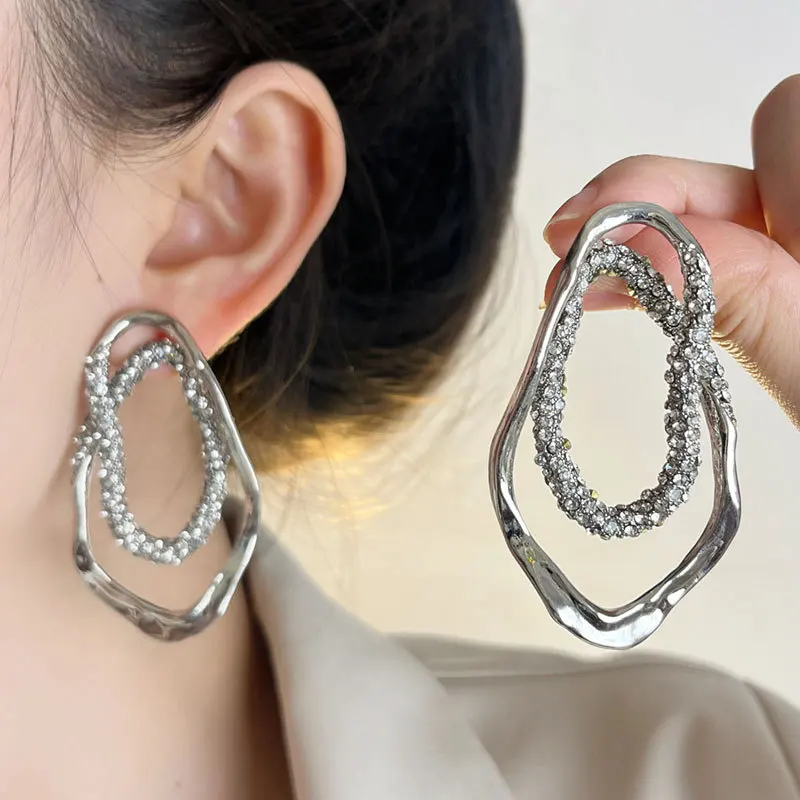 

Heavy retro exaggerated full diamond twist circle earrings female new fashion irregular earrings free delivery