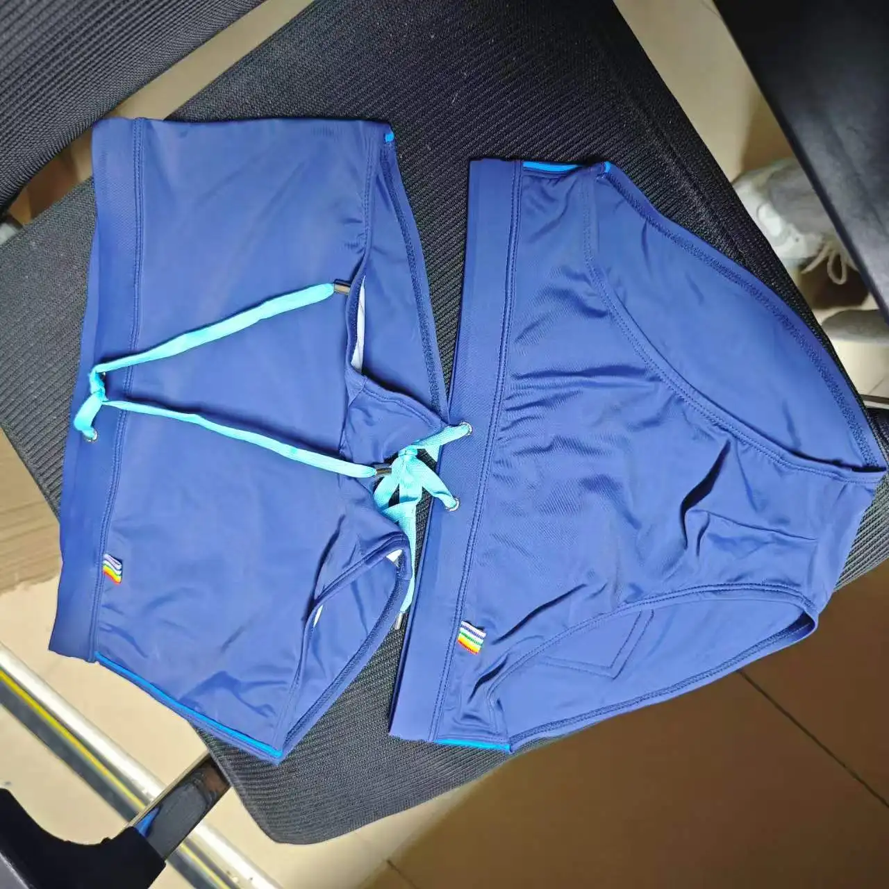 2026Combination fashion European foreign trade fashion color bar elements triangular beach swimming trunks simple UXH041-377