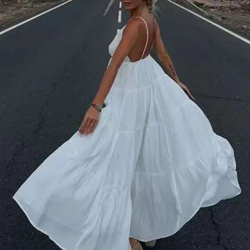 Nuovo abito Boho senza schienale con scollo a V profondo sexy Abito estivo elegante solido scava fuori Abito da festa da donna con fionda a pieghe