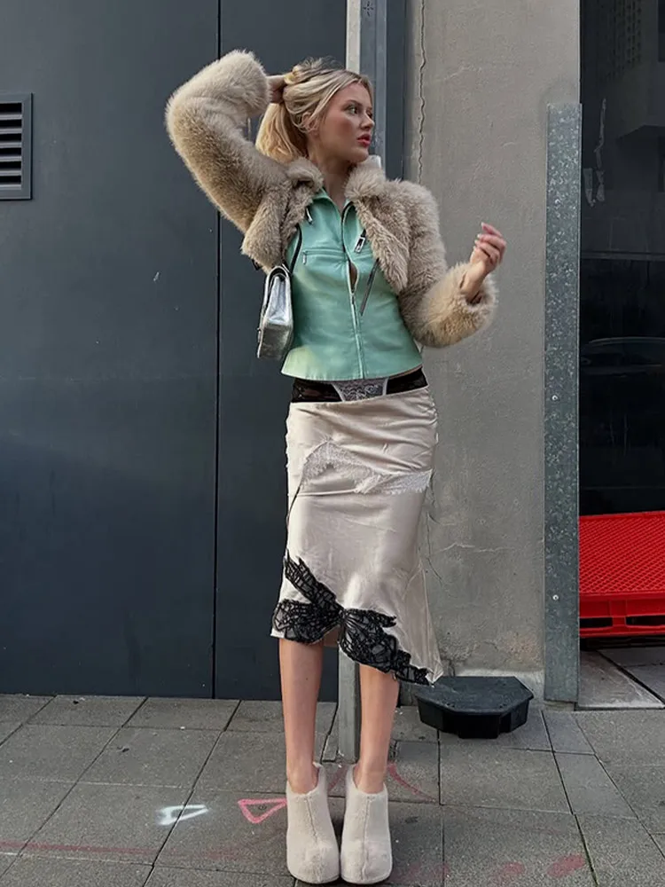 Mode recadrée fausse fourrure manteau femmes Chic solide revers manches longues mince veste courte 2025 hiver dame quotidien haute rue vêtements d'extérieur