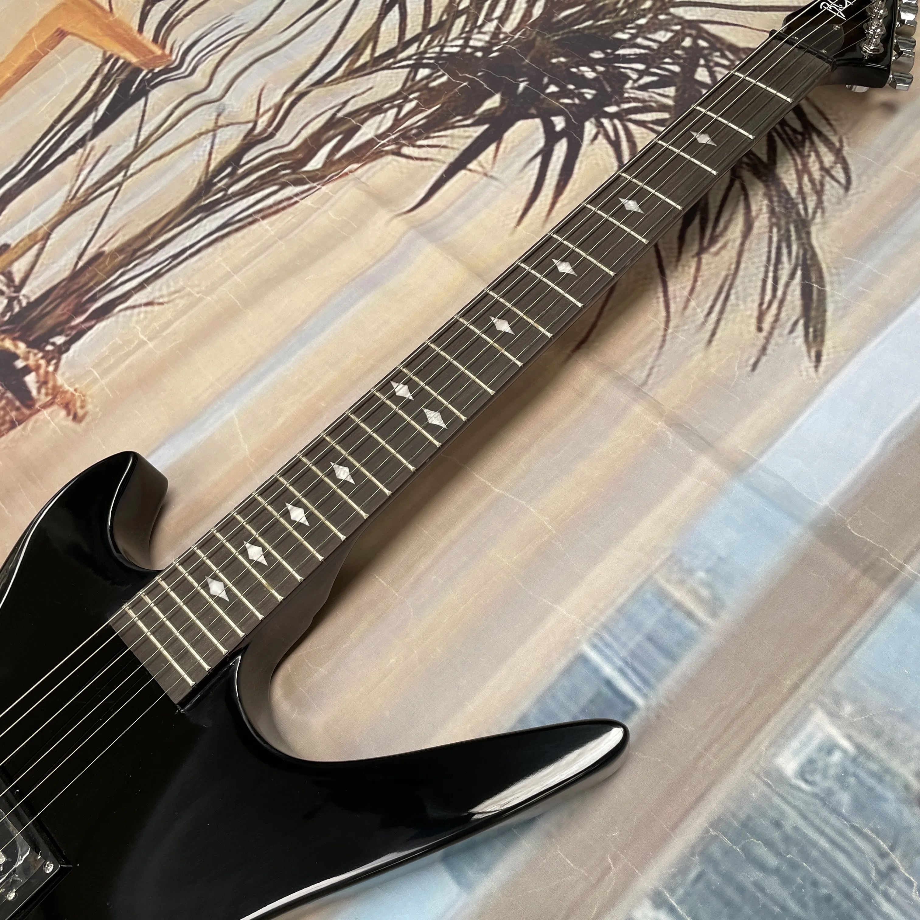 6-string black electric guitar with dual pickups and a rosewood fingerboard that feels smooth guitars. Heavy metal rock guitarra view 2