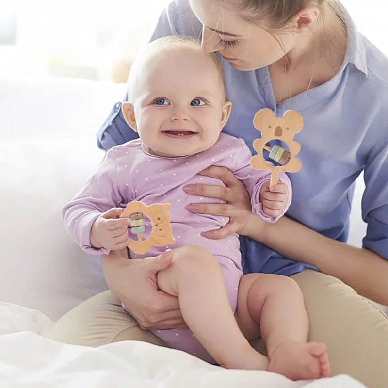 Sonajero de madera de haya para niños, 1 piezas, campanas de mano de Koala, anillo de dentición, mordedor de madera Montessori, sonajeros musicales para niños de 0 a 12 meses