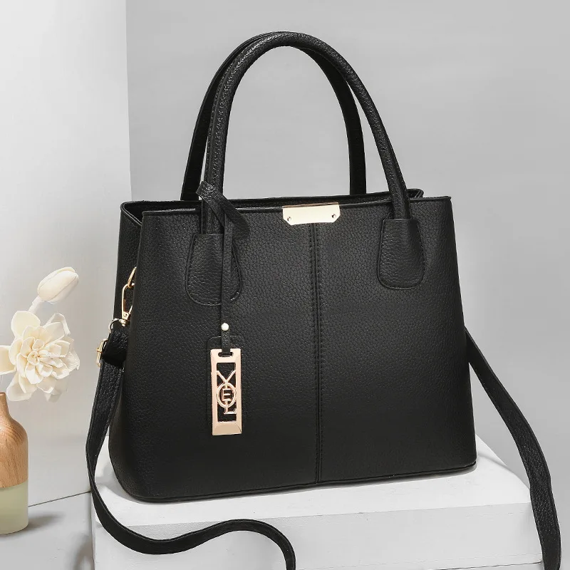 

Spring 2025 Women's Large Capacity Handbag Fashionable Shoulder Crossbody Bag with Iron Pendant Decorative Mom Bag