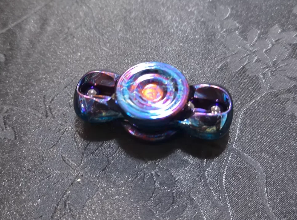 

Used EDC Water ripple storm titanium spinner Fingertip gyroscope Decompression toys