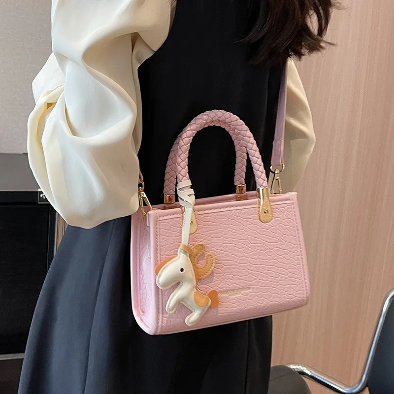 

2025 new summer versatile simple mini crossbody bag texture handheld bucket bag this year's popular small bags female