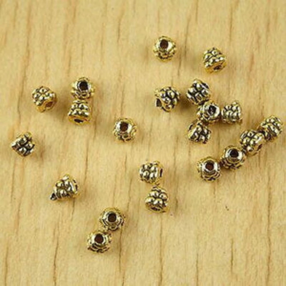 

150PCS 3.7x3.7mm hole is 1.1mm DARK GOLD-TONE STUDDED SPACER BEADS H2316