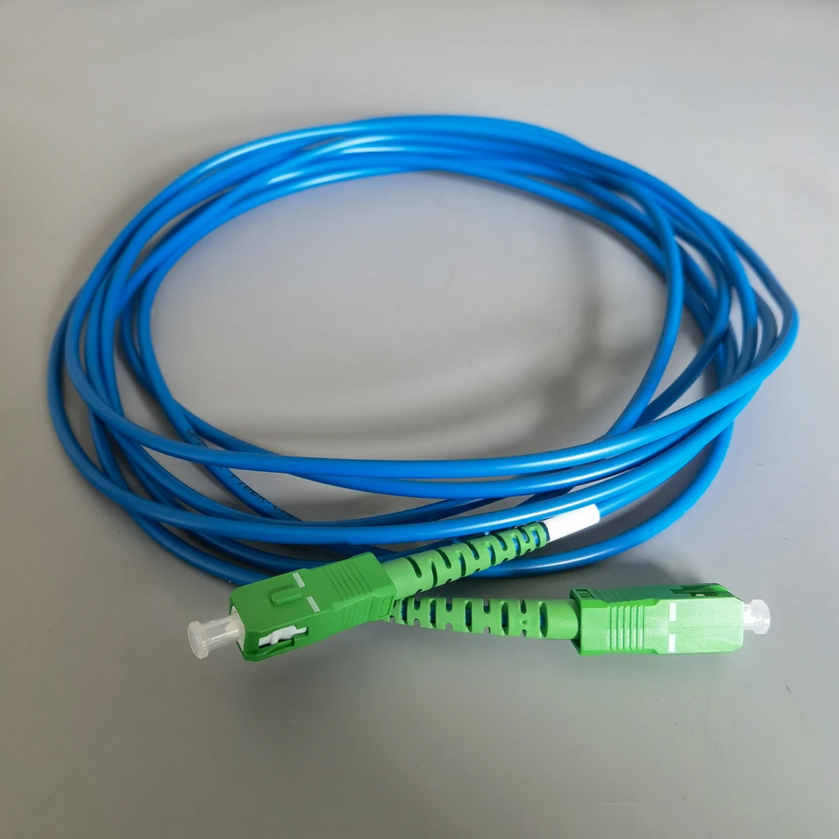 Kabel Serat Optik Mode Tunggal 3M SC/APC-SC/APC G652D Kabel Patch Dalam Ruangan FTTH Biru untuk Adaptor Gratis Internet Kecepatan Tinggi