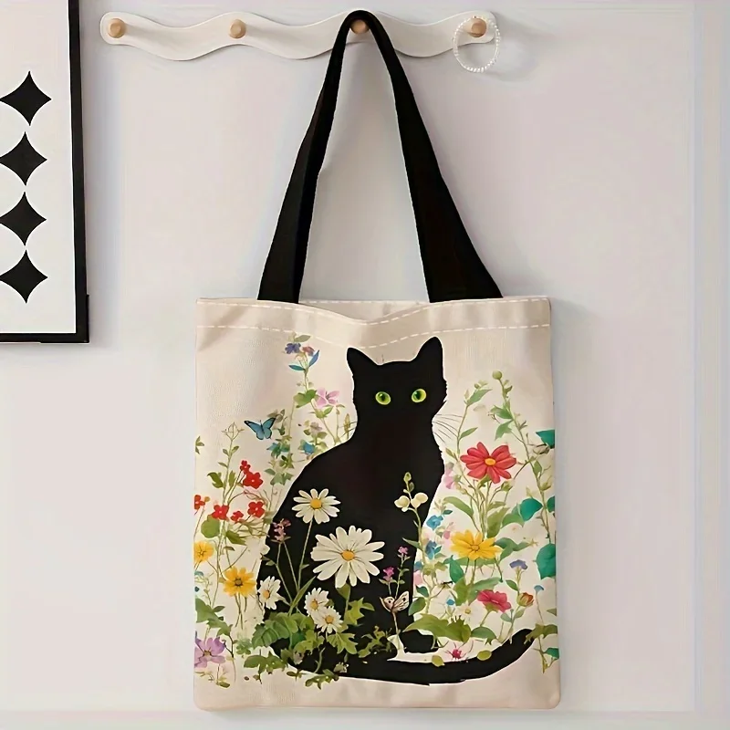 A Casual Tote Bag With A Cat And Flower Pattern This Reusable Shoulder Shopping Bag