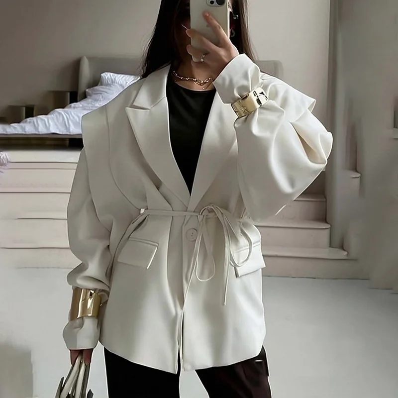 เสื้อเบลเซอร์แฟชั่นฤดูใบไม้ร่วงใหม่ สไตล์หรูหราสำหรับสาวออฟฟิศ สีพื้น ปกเสื้อแบบปกเชิ้ต  พร้อมแผ่นเสริมไหล่ แขนยาว ติดกระดุม มีเข็มขัด สำหรับผู้หญิง