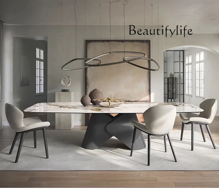 

A Light luxury rock slab dining table and chair combination modern simple living room home rectangular high-end fashion
