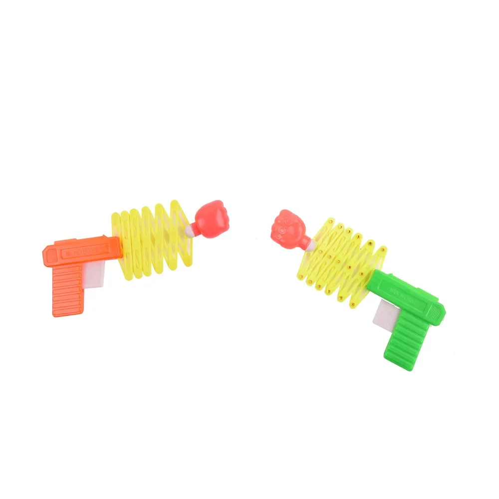 10PCS kinder spielzeug pistole kreative teleskop faust pistole mini lustige elastische frühling magische pistole kleines spielzeug