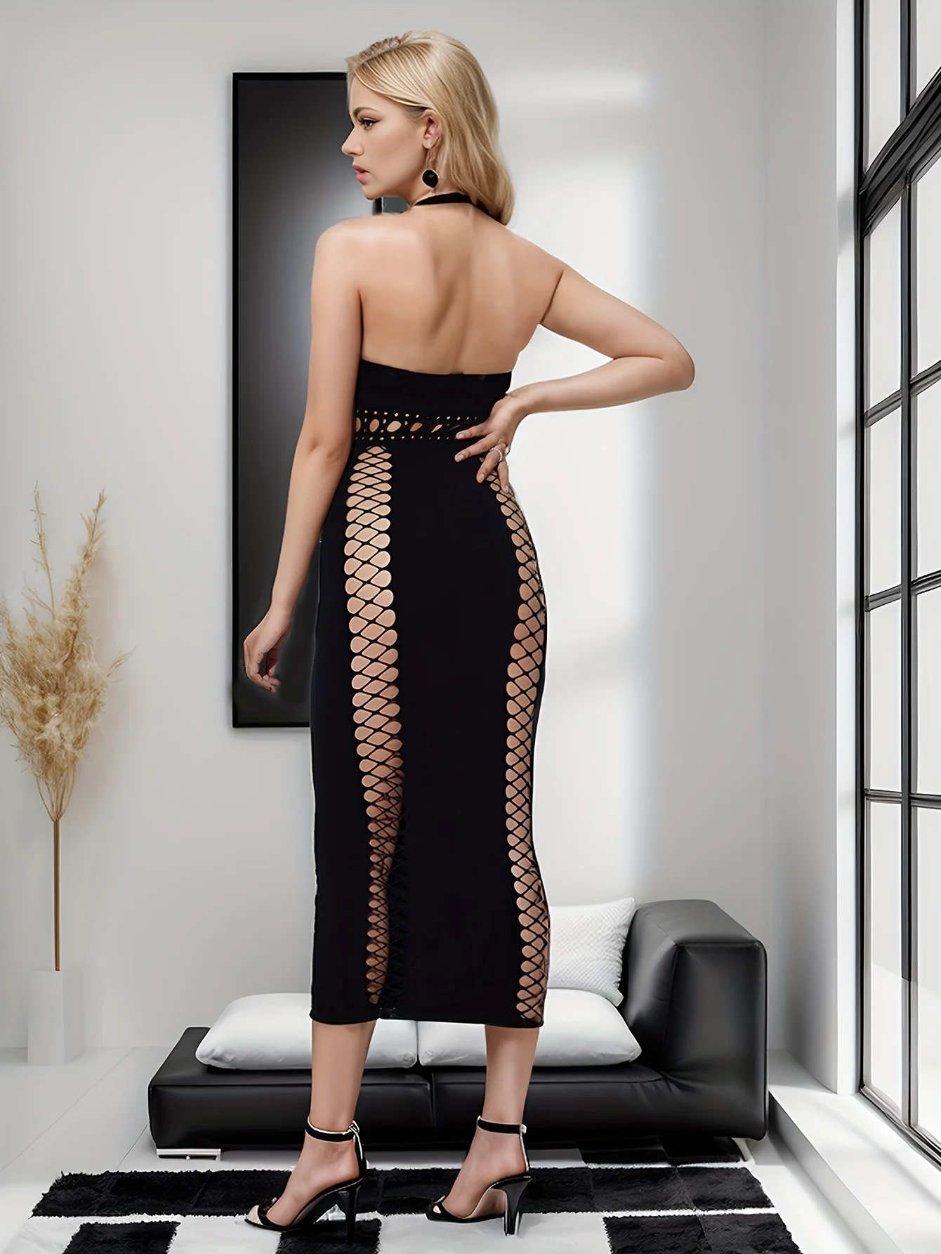 เดรสยาวผู้หญิงแบบไม่มีแขน โชว์เนื้อผ้าเว้า ดีไซน์เซ็กซี่ คอลึก ผ่าสูง ทรงเข้ารูป เหมาะสำหรับงานปาร์ตี้และคลับ