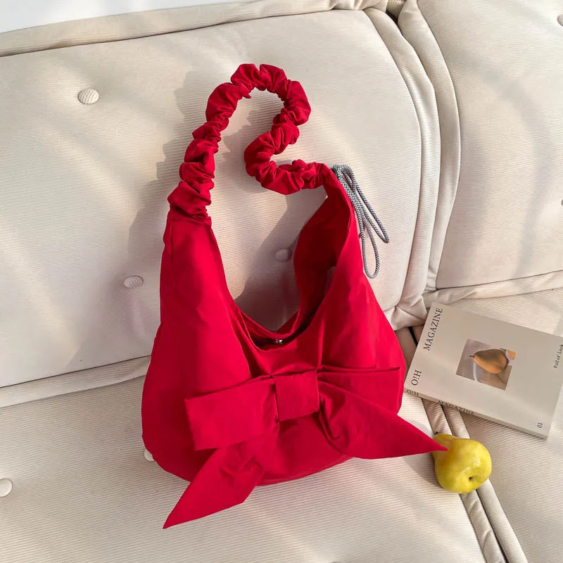 

Trendy Korean Bow Drawstring Shoulder Bag Women Fashion and Versatile Commuting Bag Large Capacity Casual and Simple Cloud Bag