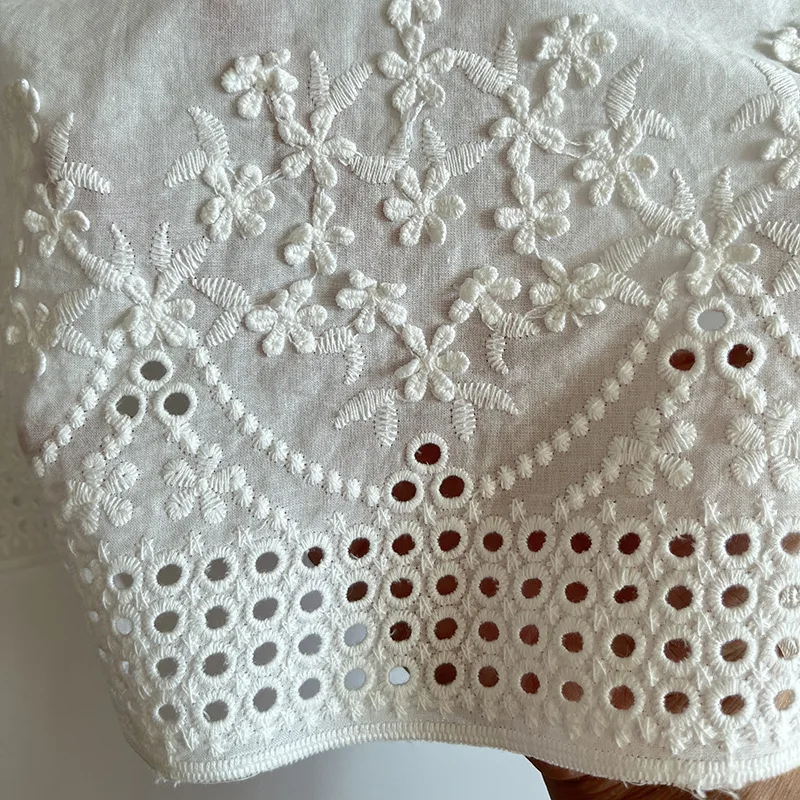 

Hollow three-dimensional floral embroidery cotton fabric is soft and breathable for designer dresses with sewing materials DIY