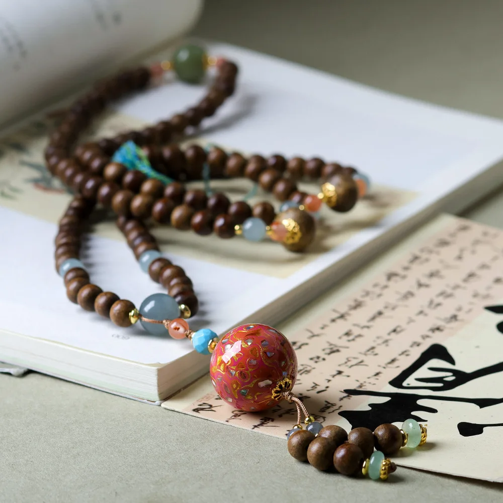 

New Chinese style first-line butter agarwood necklace, original cultural play, Chinese style lacquer pendant, sweater chain
