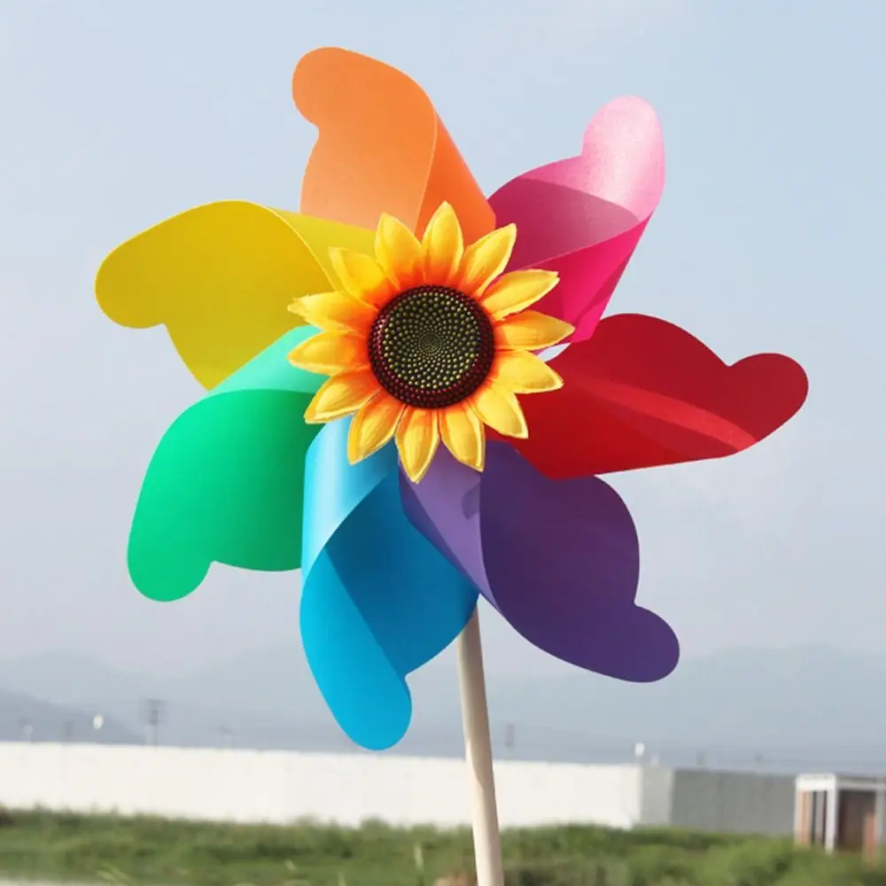 Nouveaux jouets de dessin animé pour enfants jouets pour enfants disposition moulinets jouets coloré tournesol moulins à vent en plastique fileurs à vent bricolage