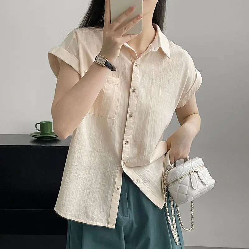 Korean Blouse 2024 New Summer Women\'s Fashion Loose Casual Polo-Neck Spliced Pockets Button Short Sleeve Solid Color Shirt Tops