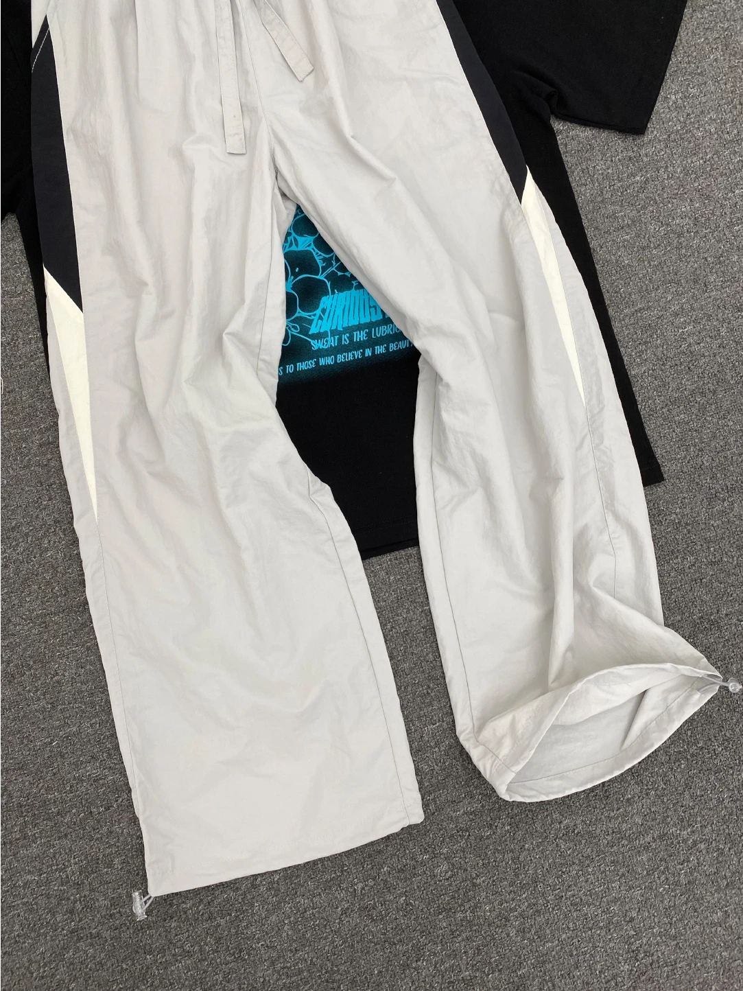 سراويل American Sle Splice Ice Silk Qui Dry للرجال صيفية رفيعة ومريحة وملمس رائع سراويل رياضية طويلة فضفاضة مستقيمة الساق...