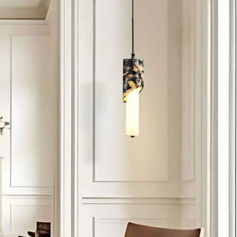 

The luxurious chandelier made of classic golden marble with warm light is suitable for dining rooms, bedrooms and studies