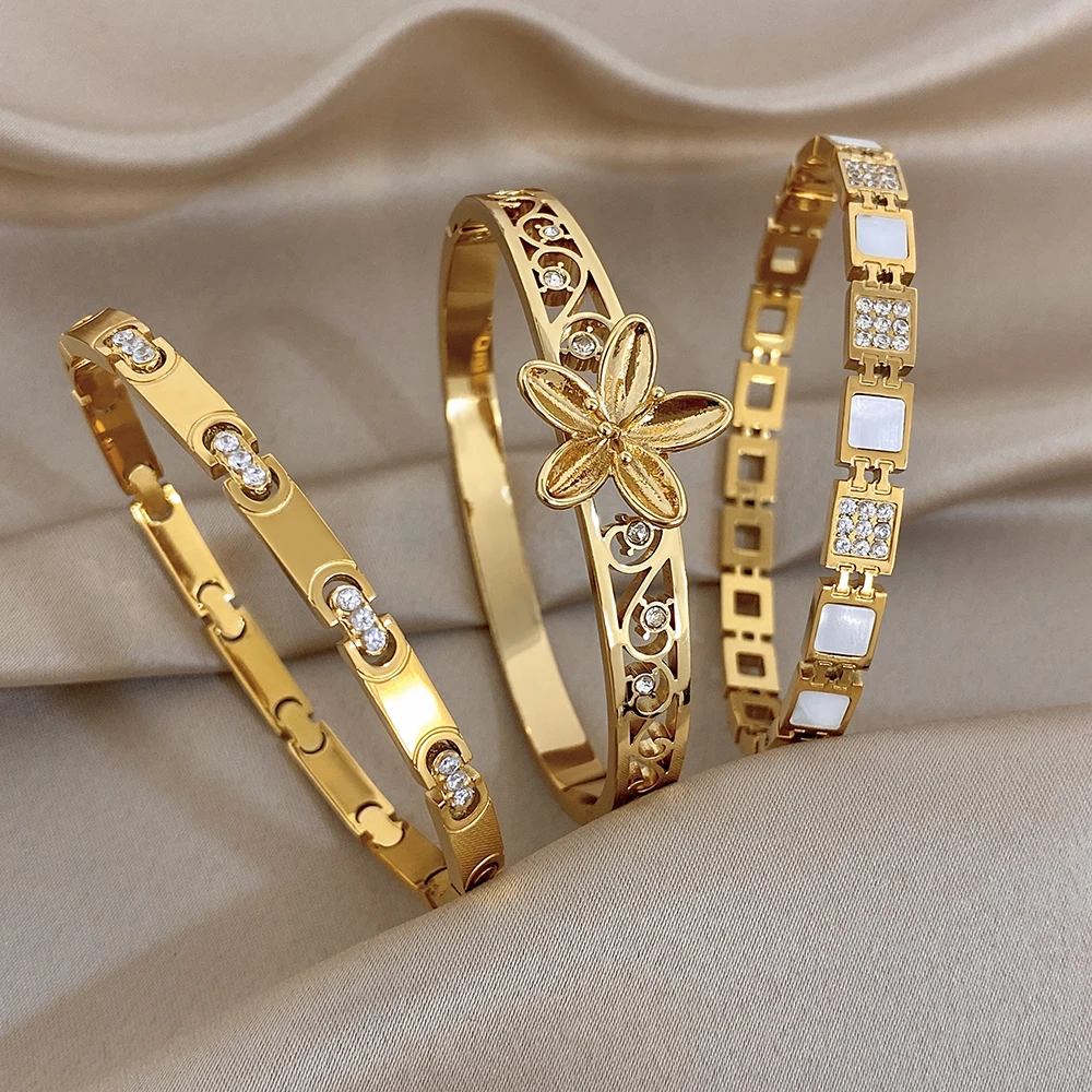 Trendiger Vergoldeter Edelstahl-Armreif für Damen Exquisites Hohles Blumenmuster Zirkonia Stapelbare Armbänder Party-Schmuck