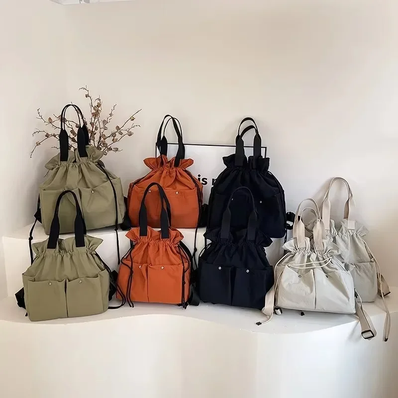 

2025 New Casual Solid String Style Nylon Backpacks Fashion Large Capacity High Quality Designer Style Personality Shoulder Bags