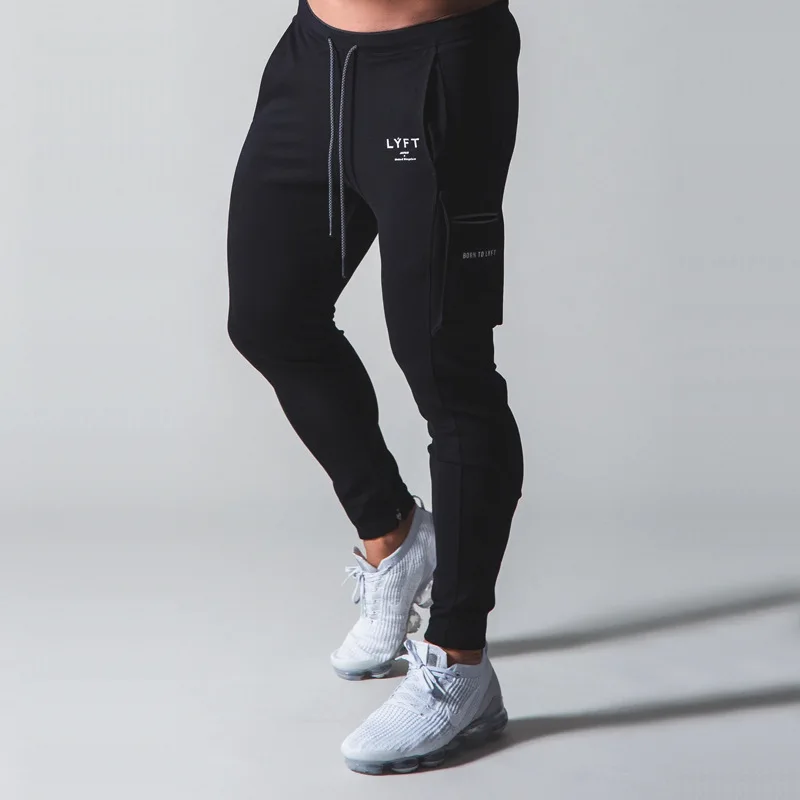 Slim fitting cotton outdoor casual pants jogger\'s multiple pockets fashionable zippered sports pants fitness men\'s pants